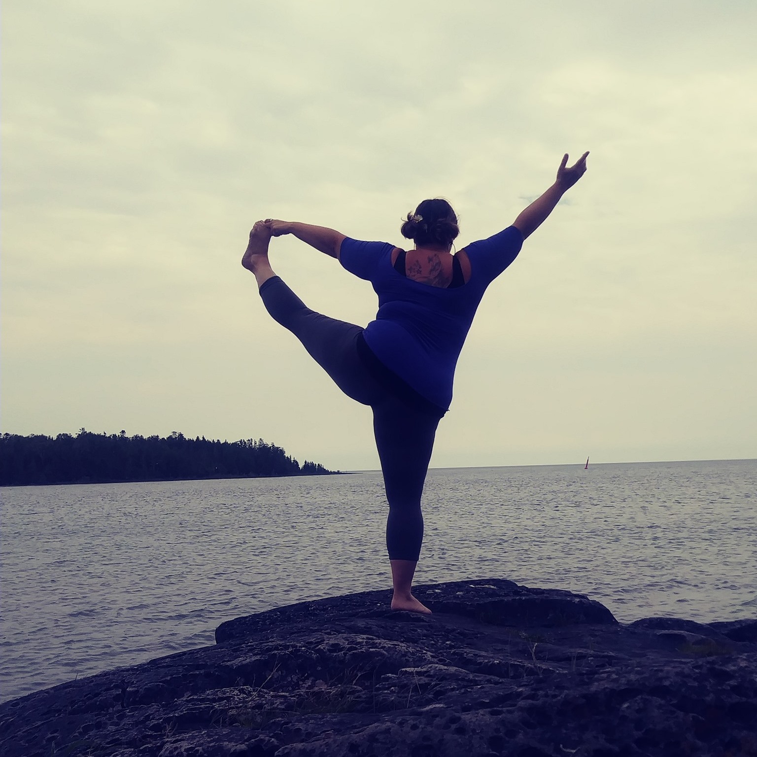 Angie Kleptz yoga poses at lake